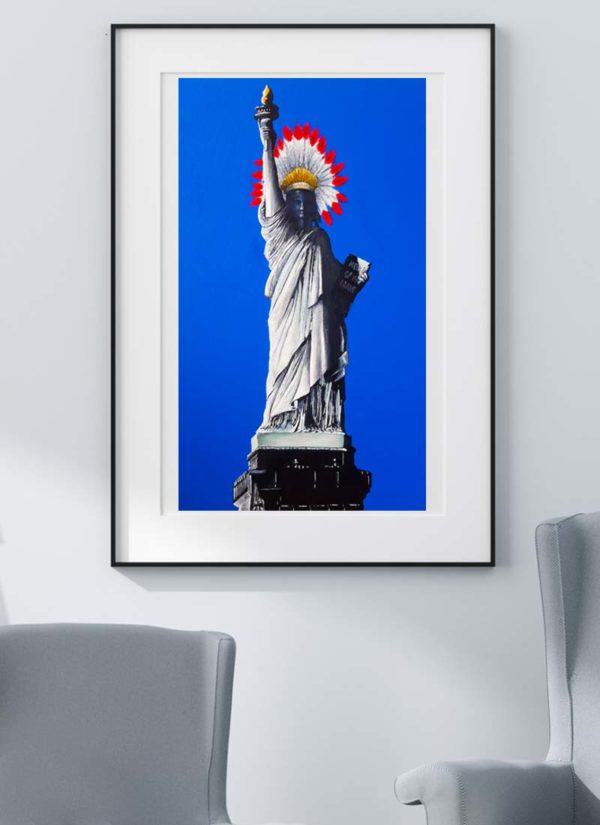 Statue of liberty wears an Indian head dress in relation to the national anthem line 'home of the brave'