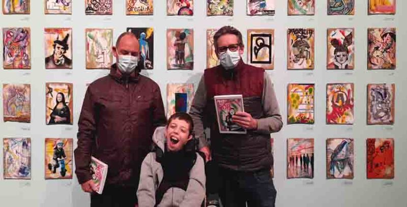 CreativeFolk artist Paul Kneen alongside Noah aka Background Bob and his dad, Nathan at the exhibition