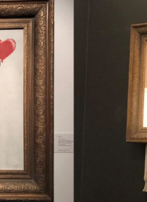 As soon as Girl with a balloon was shredded, the piece became the infamous Love is in the bin