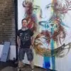 Carne Griffiths stood by one of his wonderful creations
