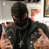The balaclava-clad artist Mason Storm