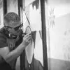 Darren Chaplin aka C73 working on a mural in Weston Super Mare earlier this year